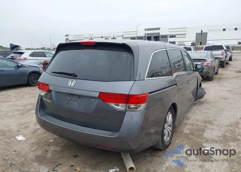 2014 Honda Odyssey Ex-L из США, поврежденный, VIN 5FNRL5H60EB084169